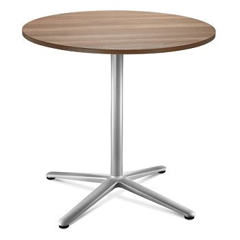 Swoosh round dining table